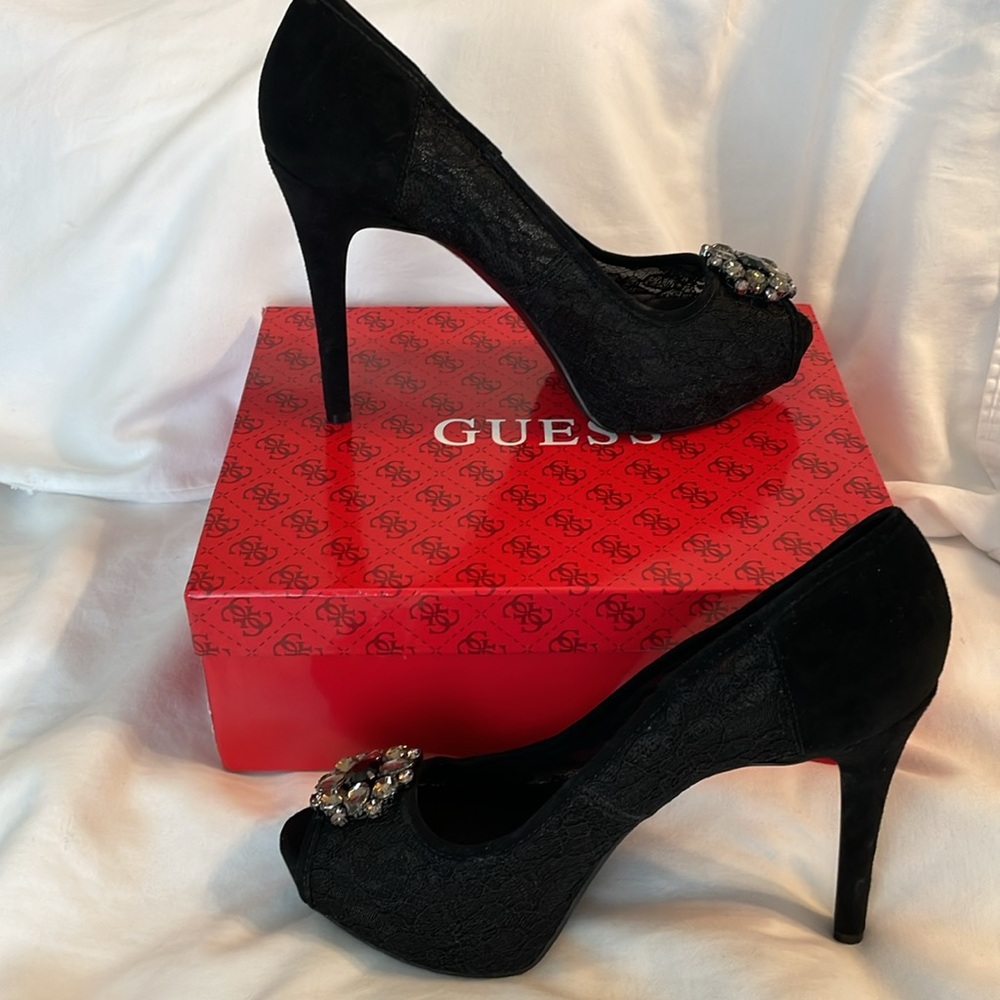 Authentic Guess black peep toe heel is lace and suede with jewel design. Size 10